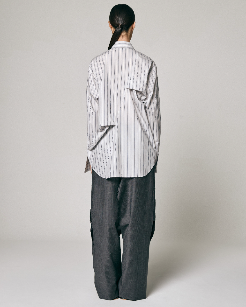 ASYMMETRIC DRAPED SHIRT