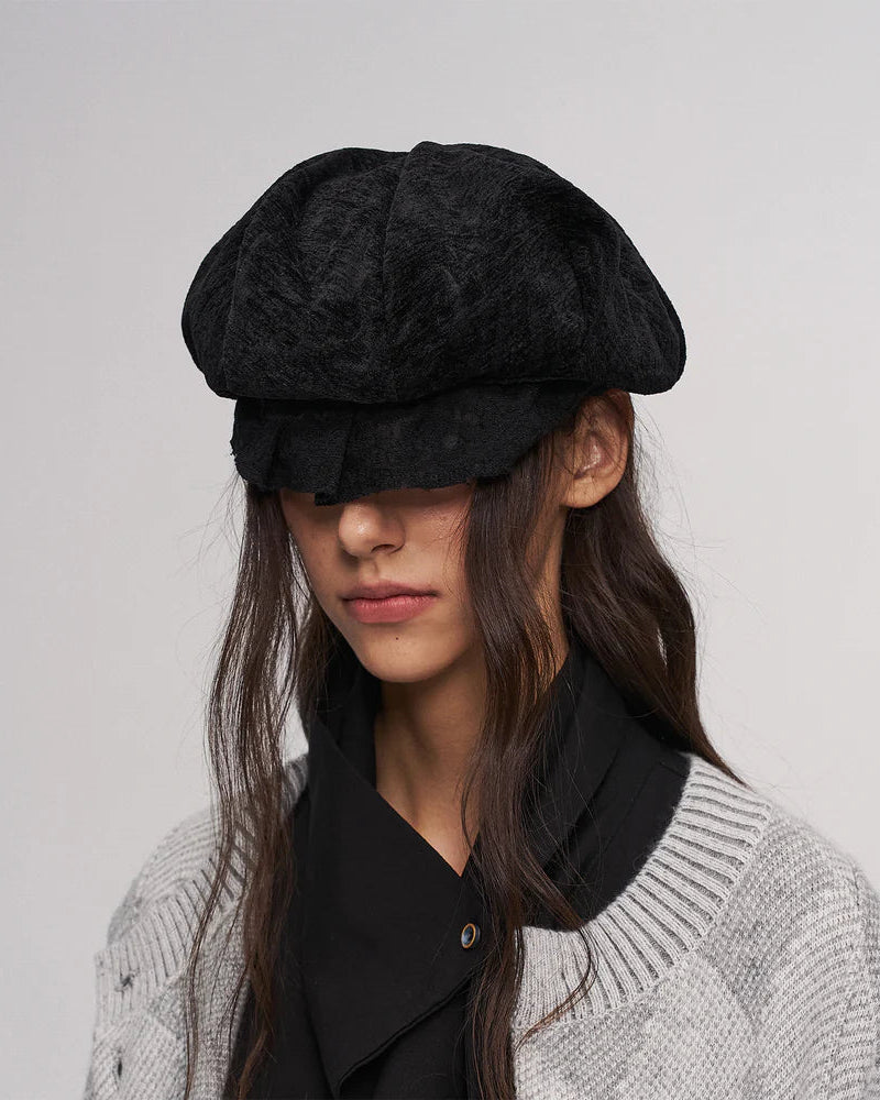 Black ruffled beret