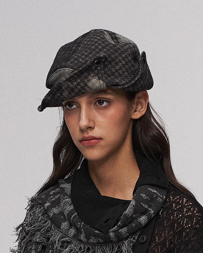 Fold-down, oddly shaped hat in black and green