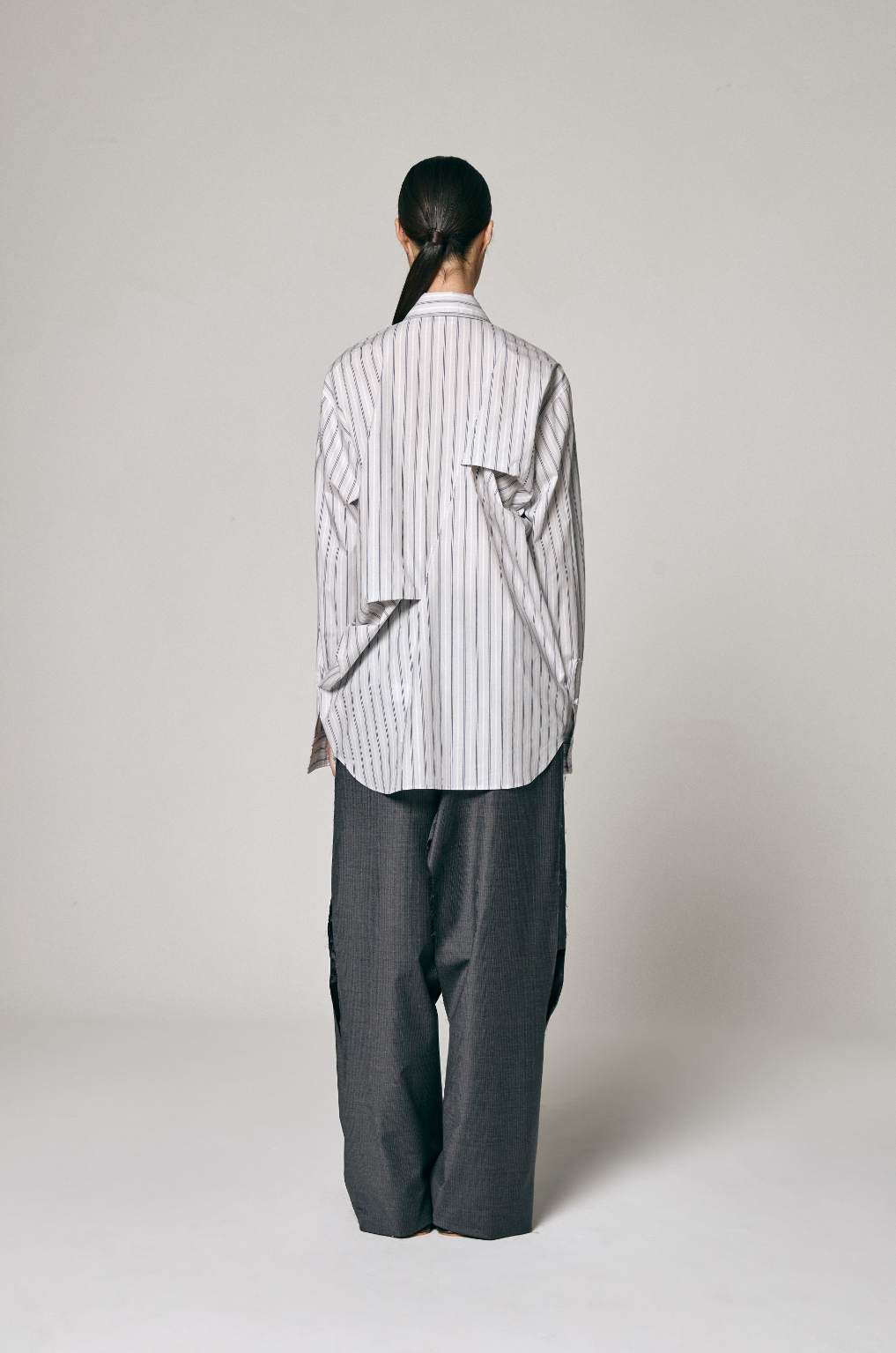 ASYMMETRIC DRAPED SHIRT