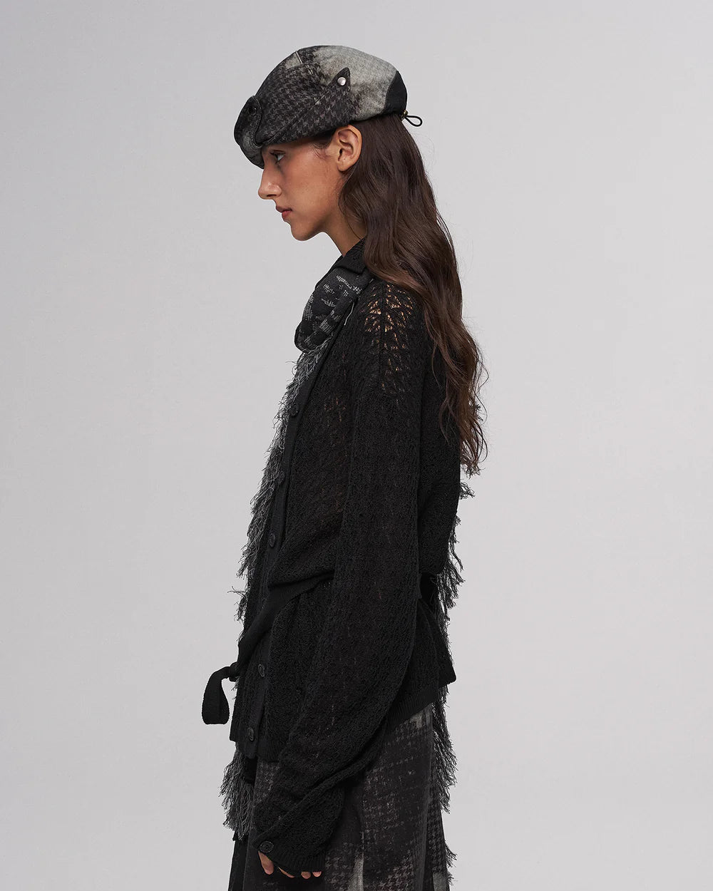 Fold-down, oddly shaped hat in black and green