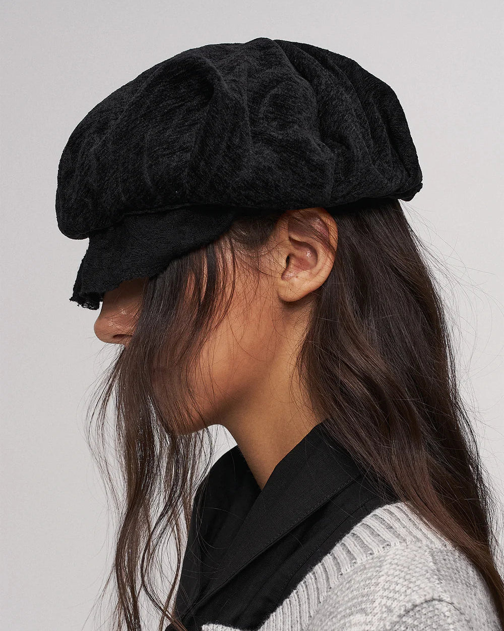 Black ruffled beret
