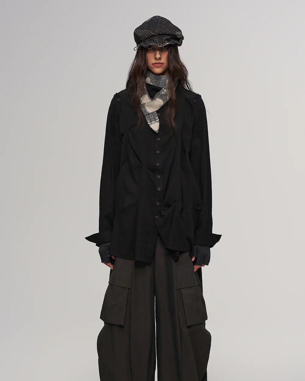Fold-down, oddly shaped hat in black and green