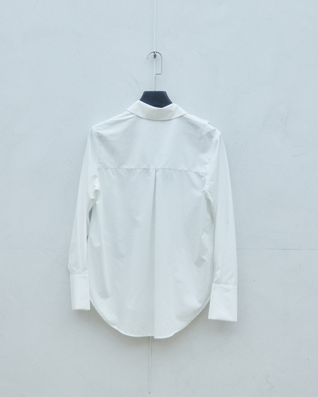 White court-style ruffled blouse