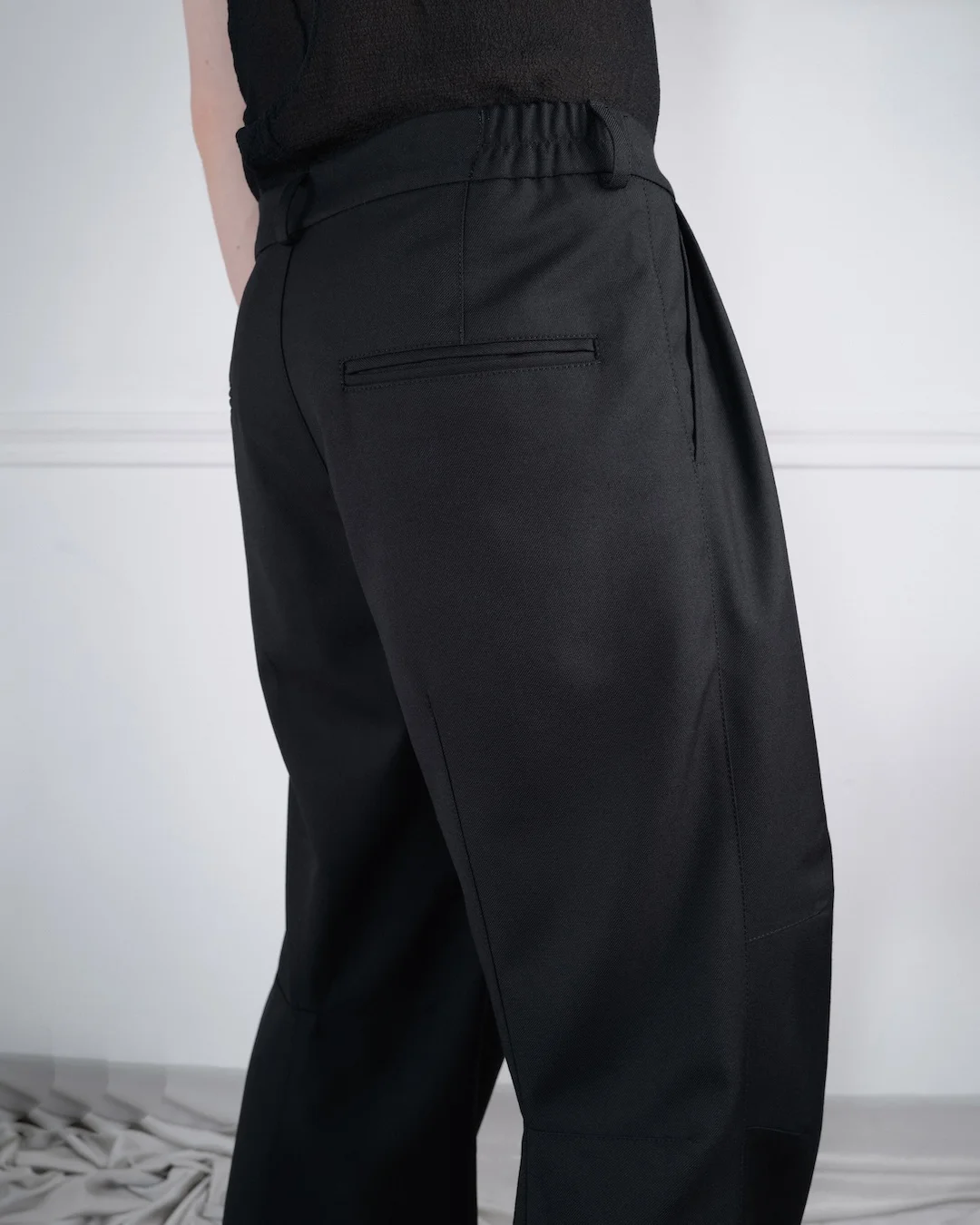 ARTICULATED WOOL TROUSERS