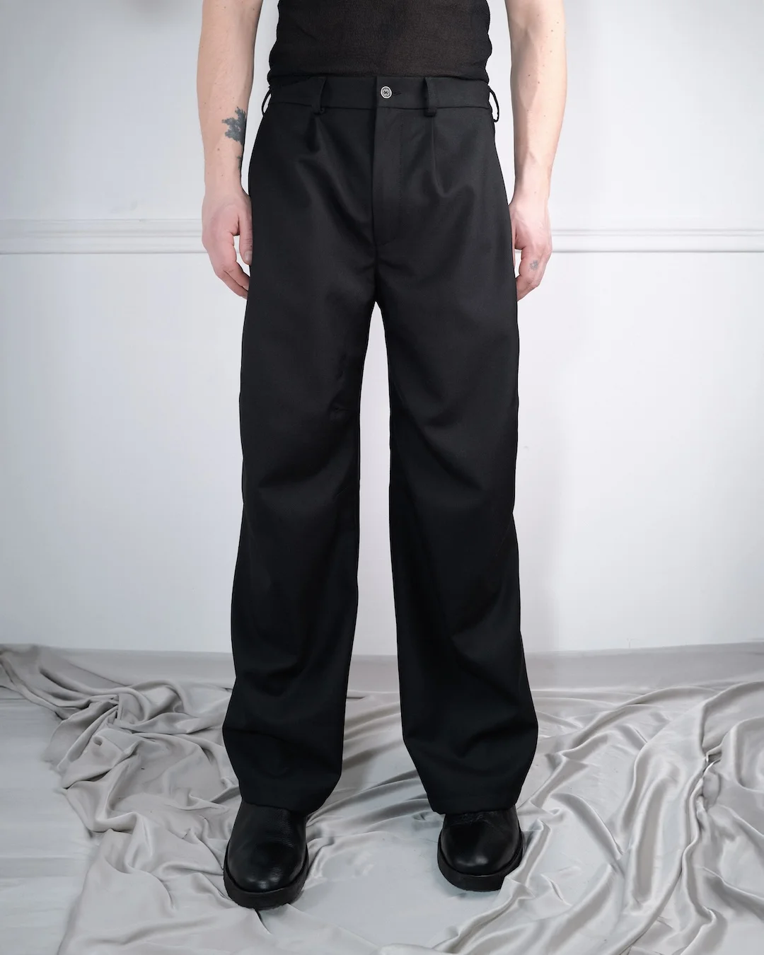 ARTICULATED WOOL TROUSERS