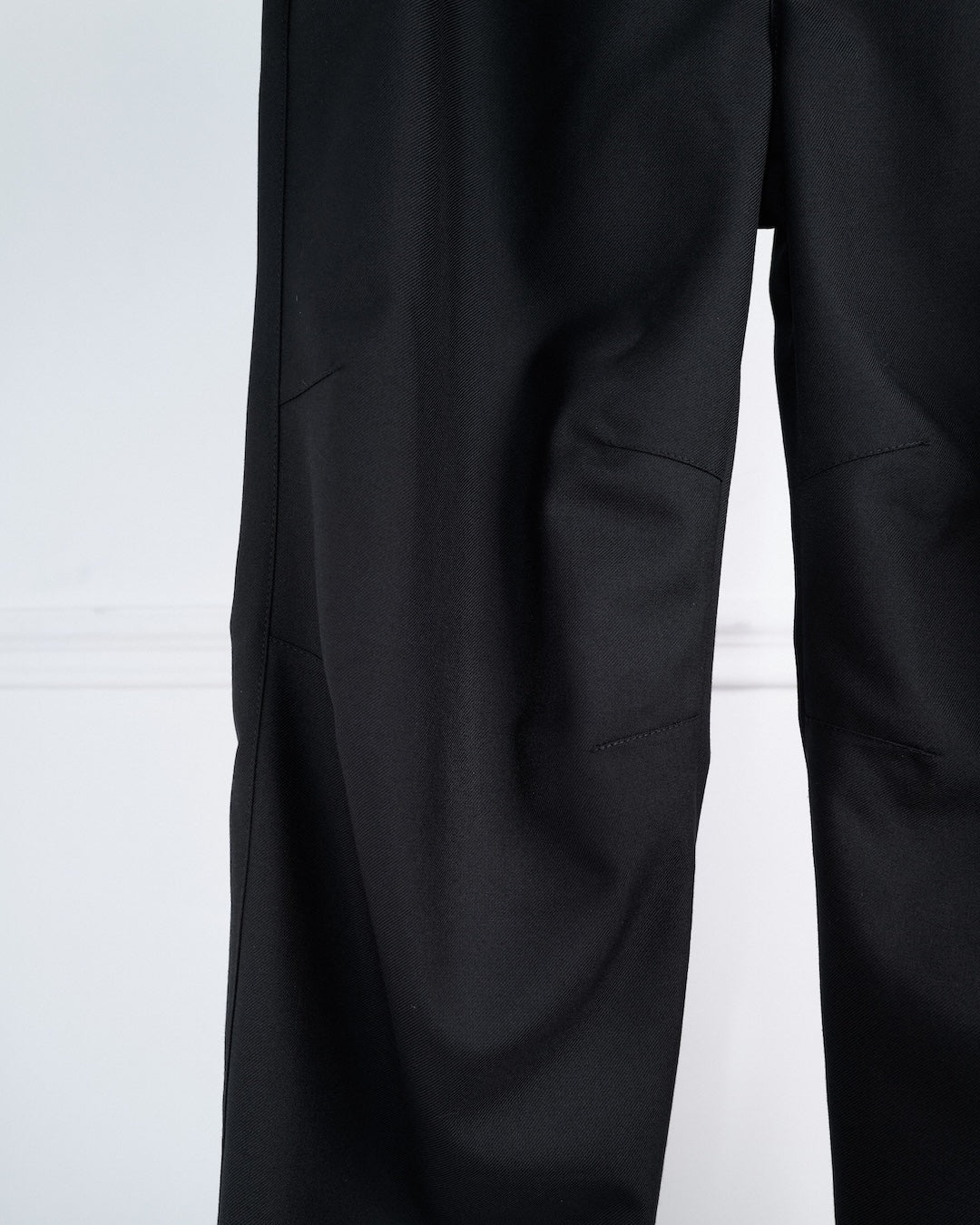 ARTICULATED WOOL TROUSERS