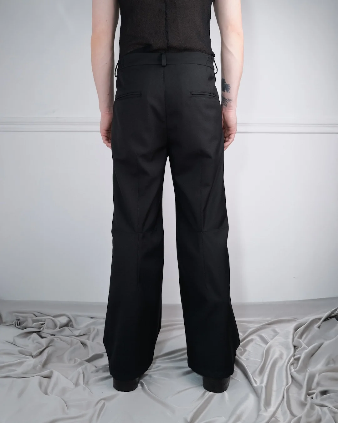 ARTICULATED WOOL TROUSERS
