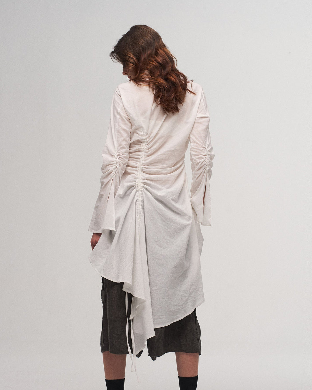 White pleated shirt dress